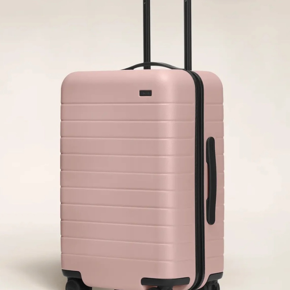 Away Bigger Carry-on Luggage Suitcase in Blush Pink with accessories
